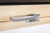 Silberfarbener Griff am Holzprofil des FTP GREENVIEW Dachfensters